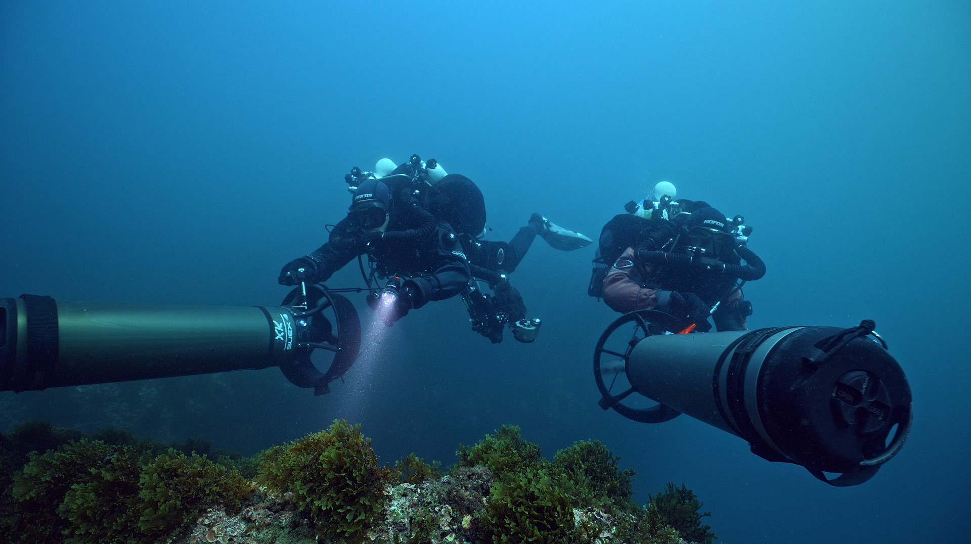 Divers at work underwater