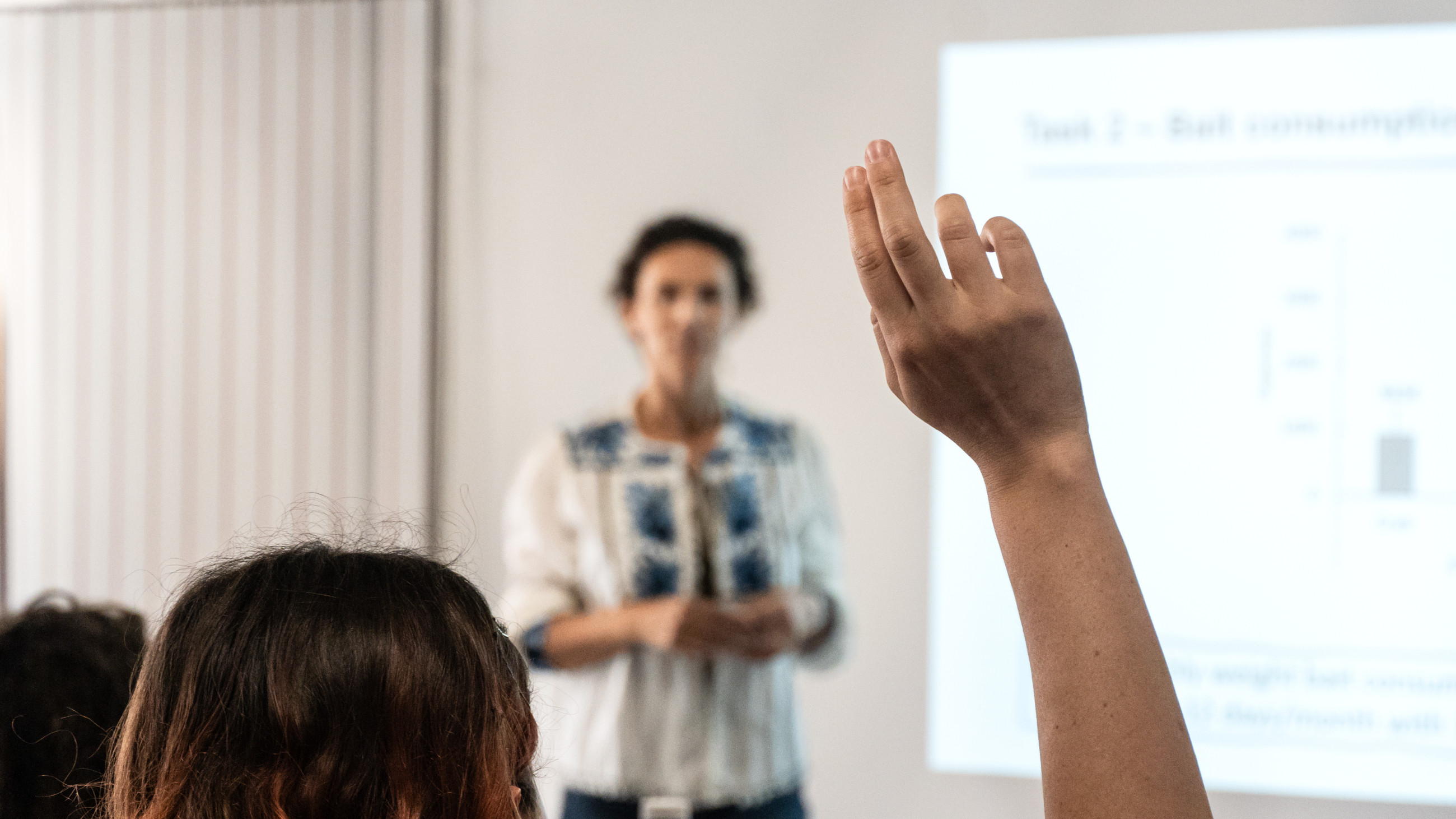 Hand in the air to express doubt to the speaker